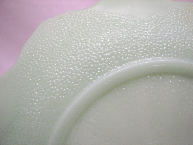 nice jadeite plate with floral petal design. No apparent makers 